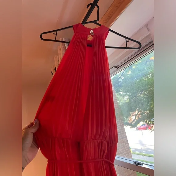 Beautiful vibrant orange high neck jumpsuit